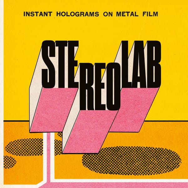 Hey, look, it's a Stereolab album cover. It says "Stereolab" in black sans serif on yellow and pink.